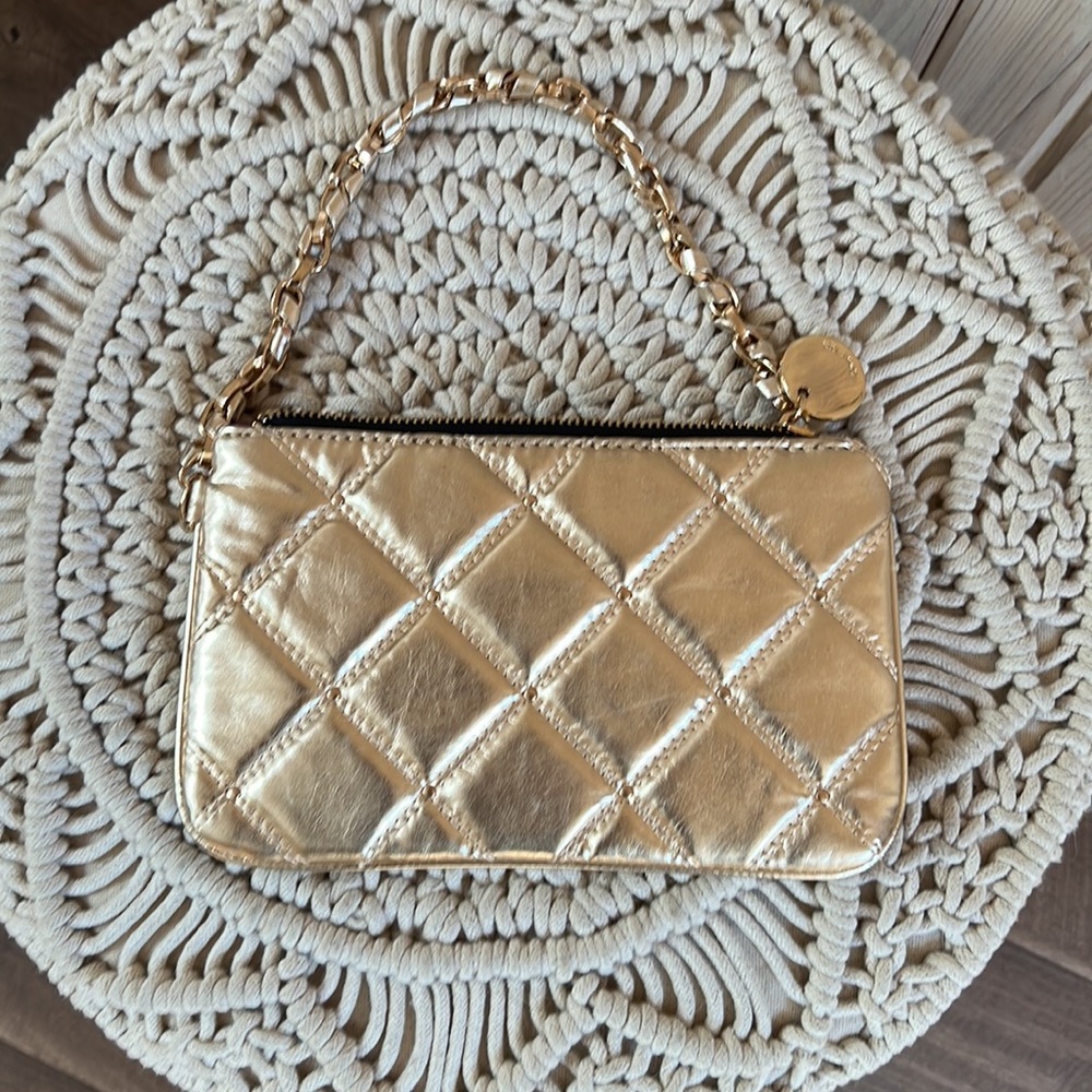 Gold Deux Lux clutch with purple lining